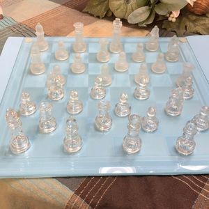2 glass game boards, with all game pieces